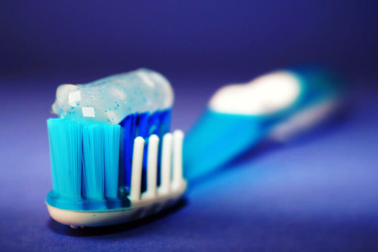 close up of toothpaste on a toothbrush