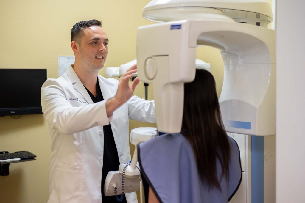 Dr. Heiss prepping a CBCT for a patient