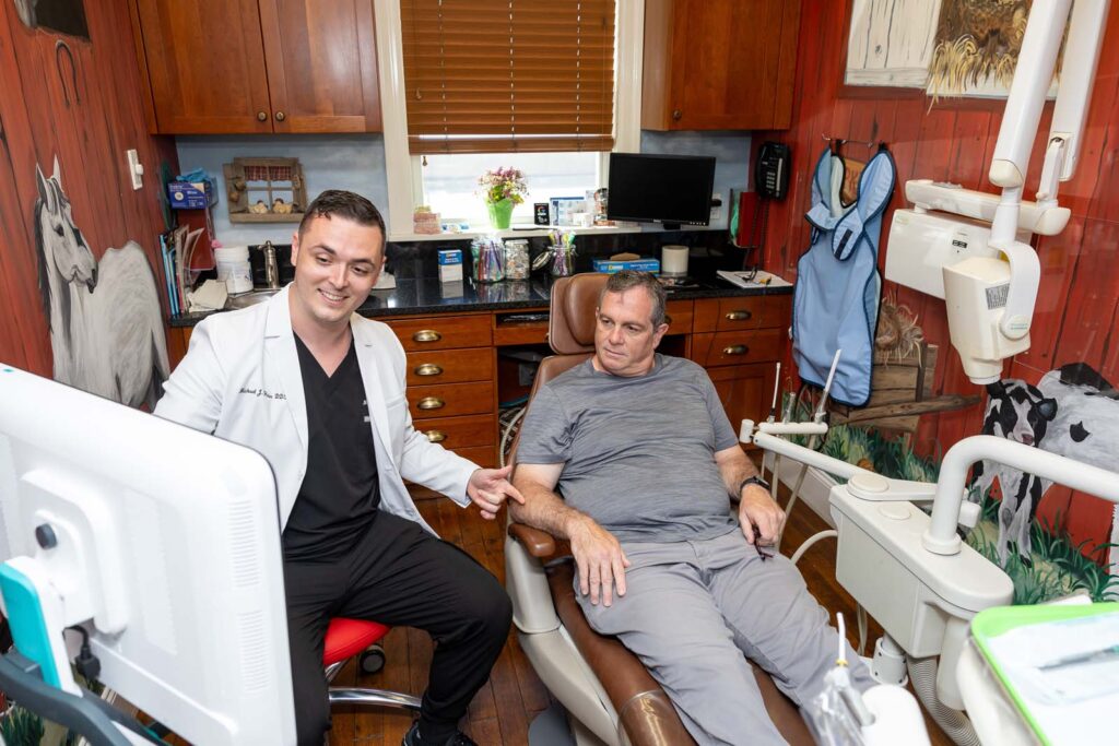 Dr. Heiss showing a patient an x-ray